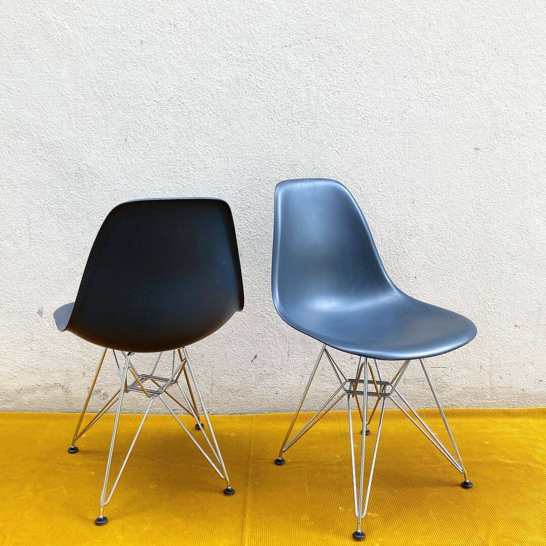 Pair of black Vitra DSR chairs