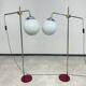 Modern mid-century chrome floor lamps in pairs