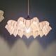 Art Deco trio of suspensions in coloured frilled opaline, 1920-30.