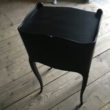 Bedside or nightstand painted black with patterns