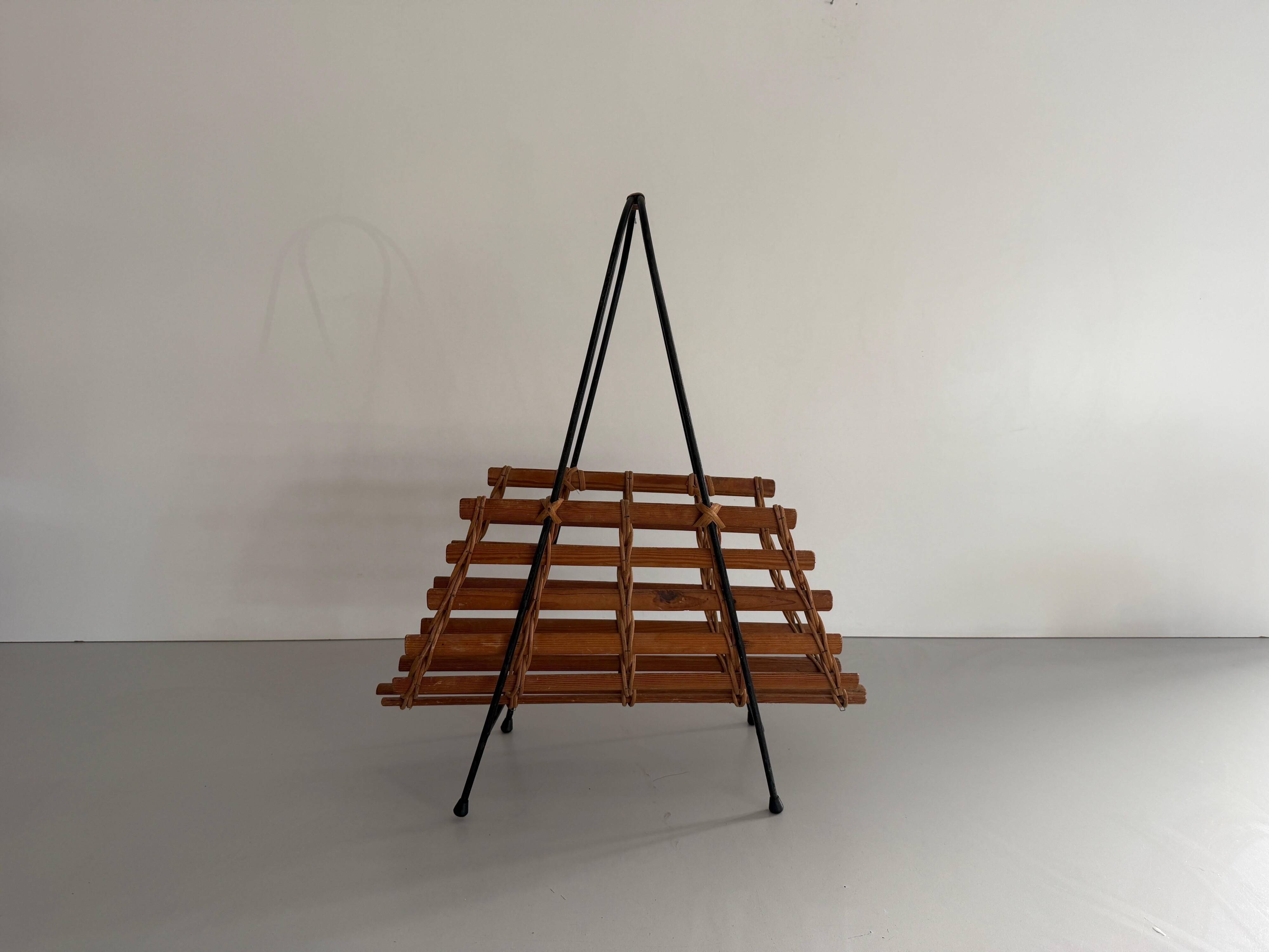 Mid-century black metal and wicker magazine rack, 1960, Germany