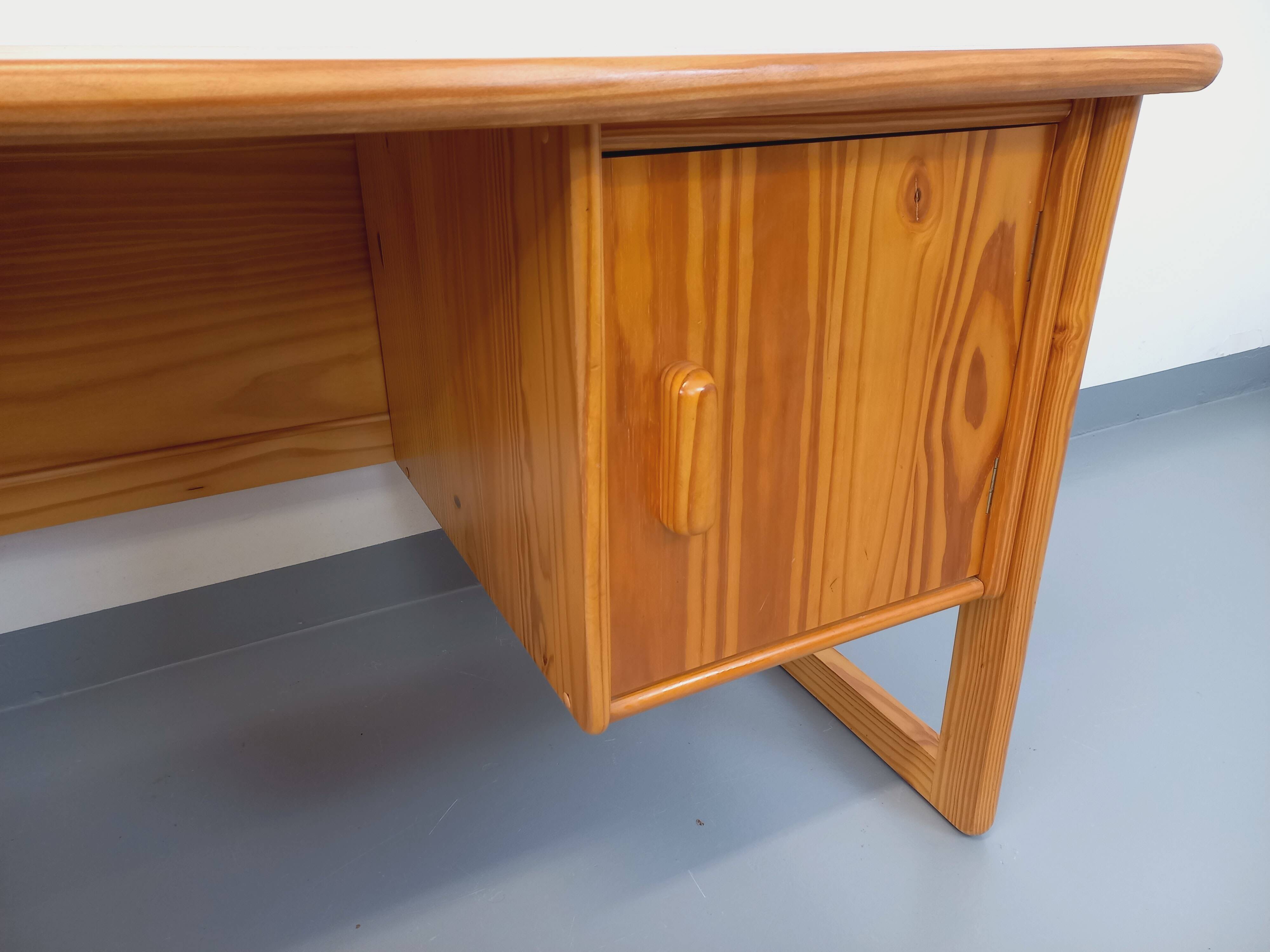 Vintage sled leg pine executive desk from the 60s-70s