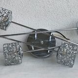 Articulated chromed metal luminaire