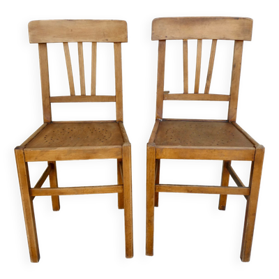 Paire de chaises de bistrot avec assise perforée