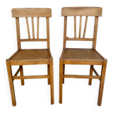 Pair of bistro chairs with perforated seat