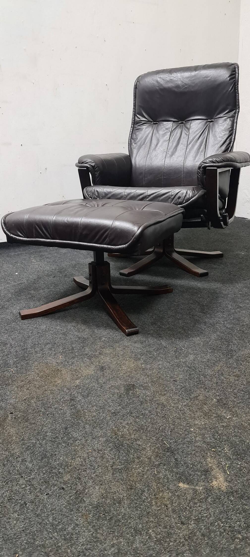Vintage leather reclining swivel chair with foot stool