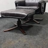 Vintage leather reclining swivel chair with foot stool