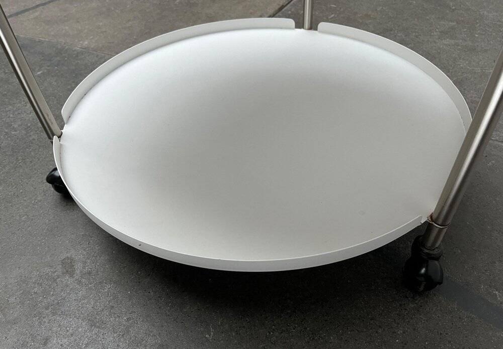 Minimalist Thrill metal coffee table or side table with wheels by Leitmotiv.