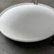 Minimalist Thrill metal coffee table or side table with wheels by Leitmotiv.