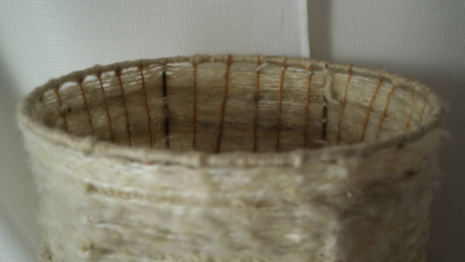 Vintage ceramic lamp with a wool shade.