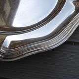 Silver metal dish with twisted edges