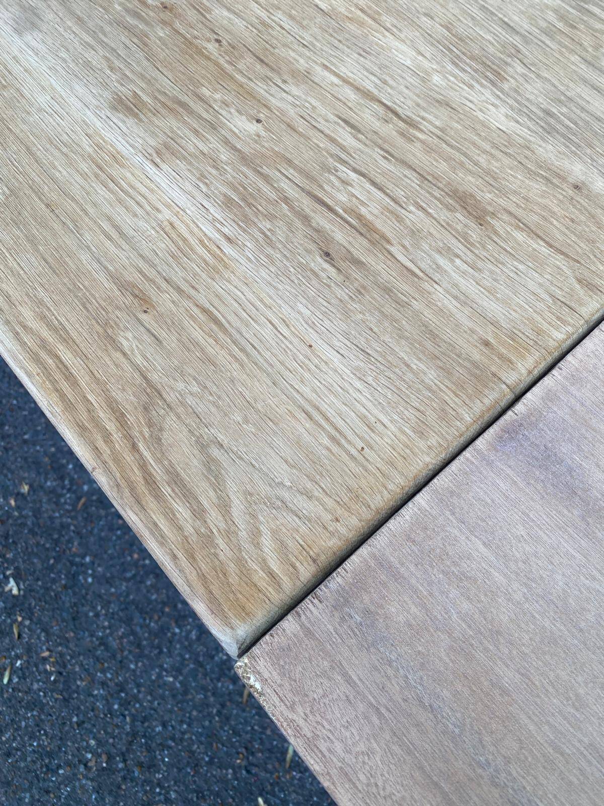 Renovated extendable farmhouse dining table made of solid raw oak from the 1950s.