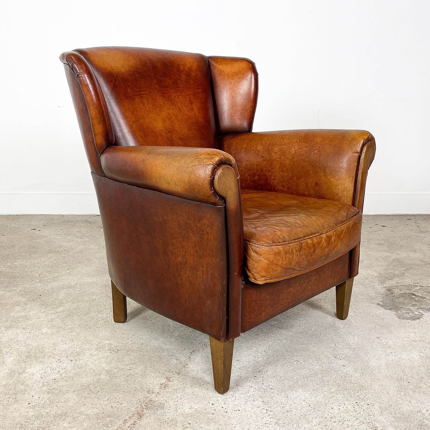Vintage sheep leather wingback armchair zuna