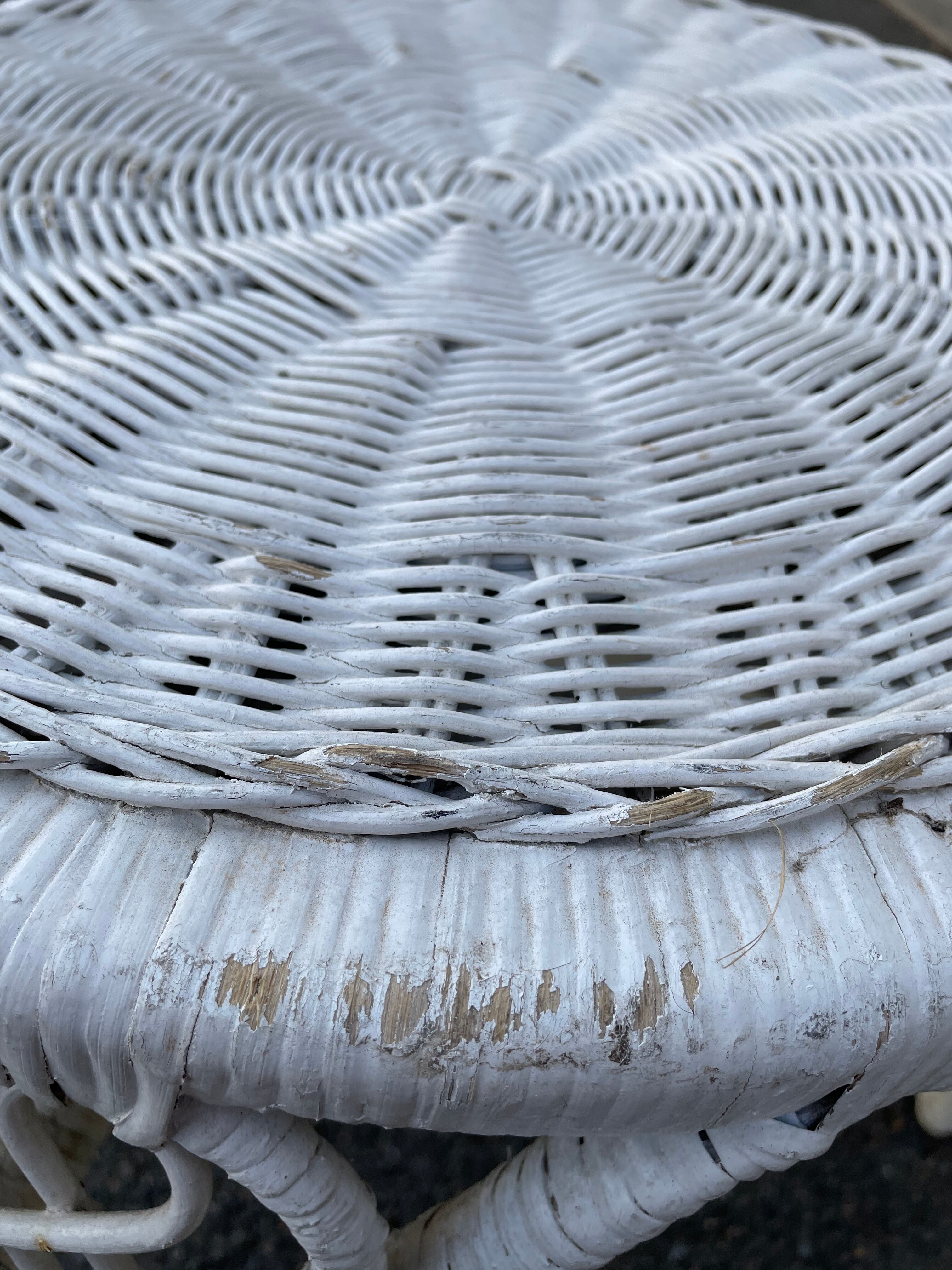 Pair of white peacock rattan chairs, circa 1960