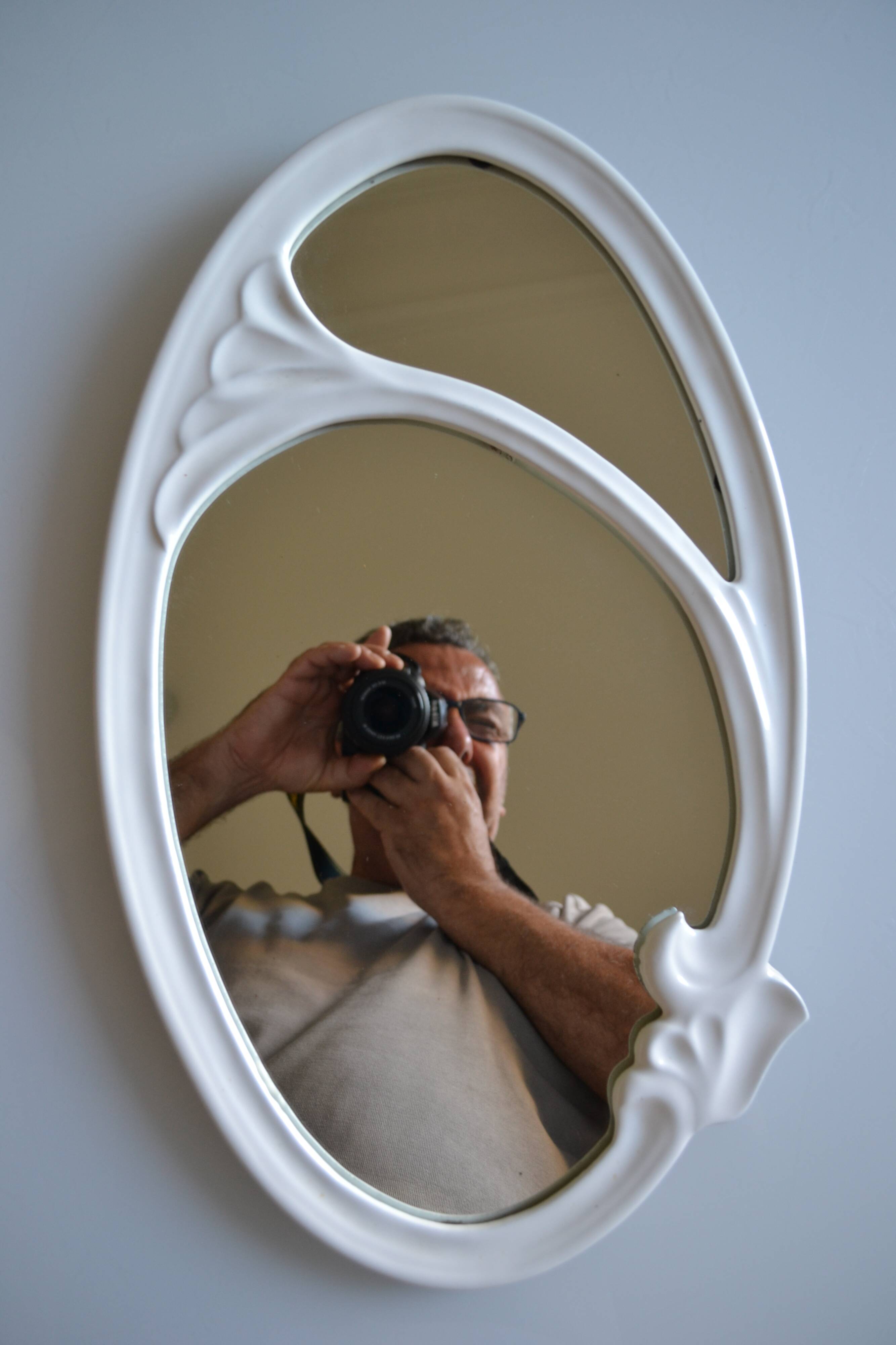 Oval mirror in art nouveau jugendstil style in enamelled cast iron 49 x 29