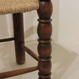 Pair of rustic chairs in turned wood with straw seats