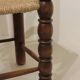 Pair of rustic chairs in turned wood with straw seats