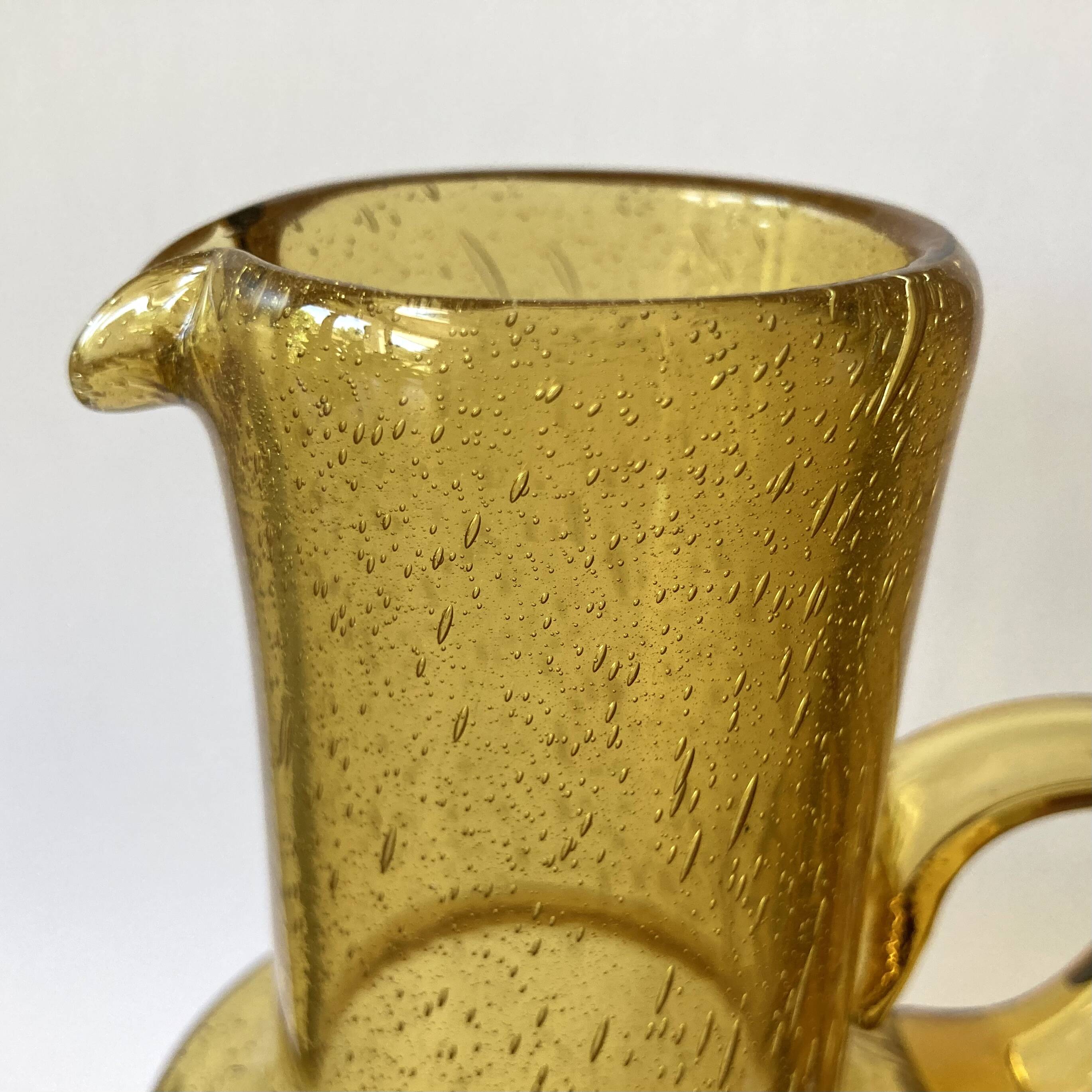 Vintage pitcher or jug forming a vase in amber and bubbled glass in the style of Biot glassware