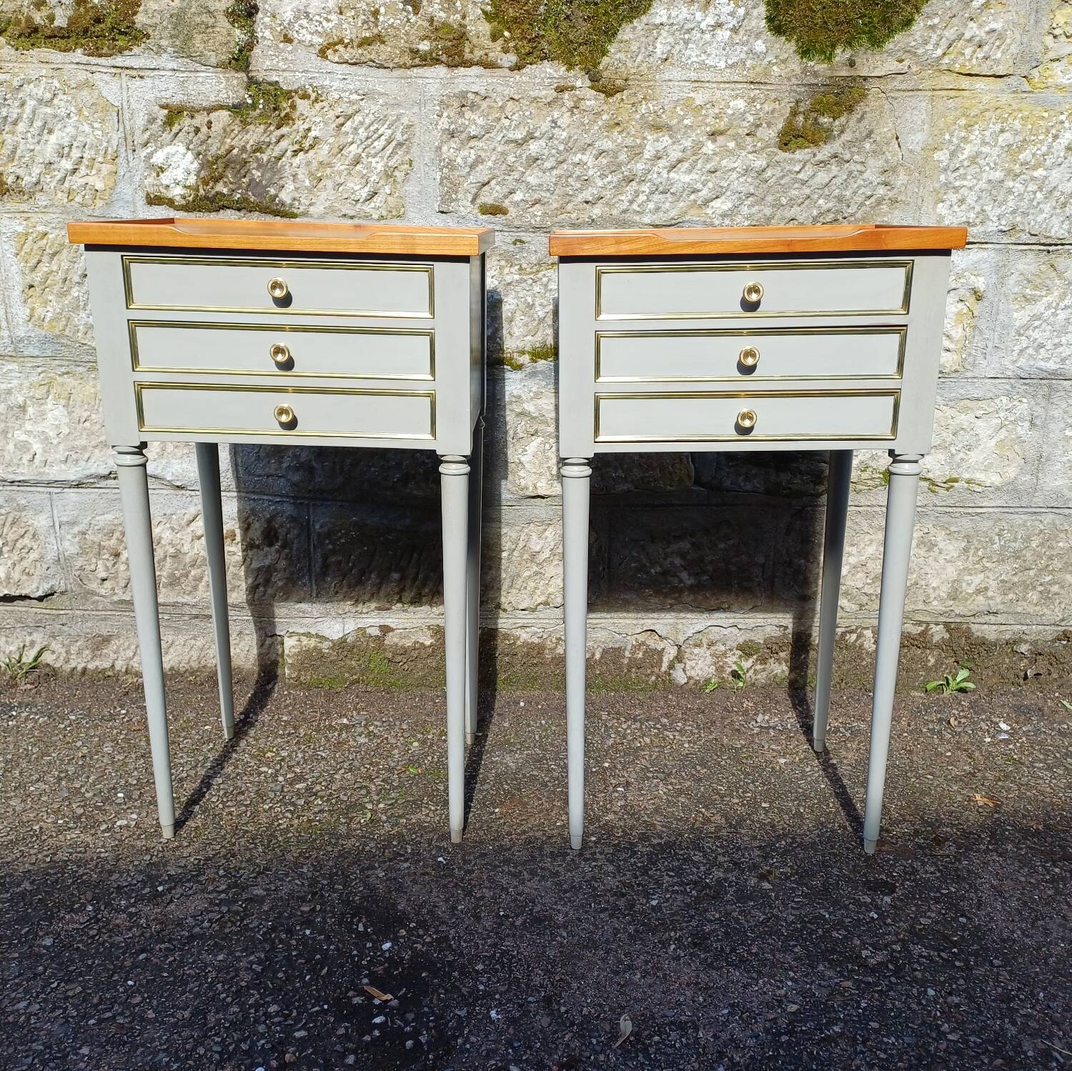Pair of patinated bedside tables in Louis XVI style