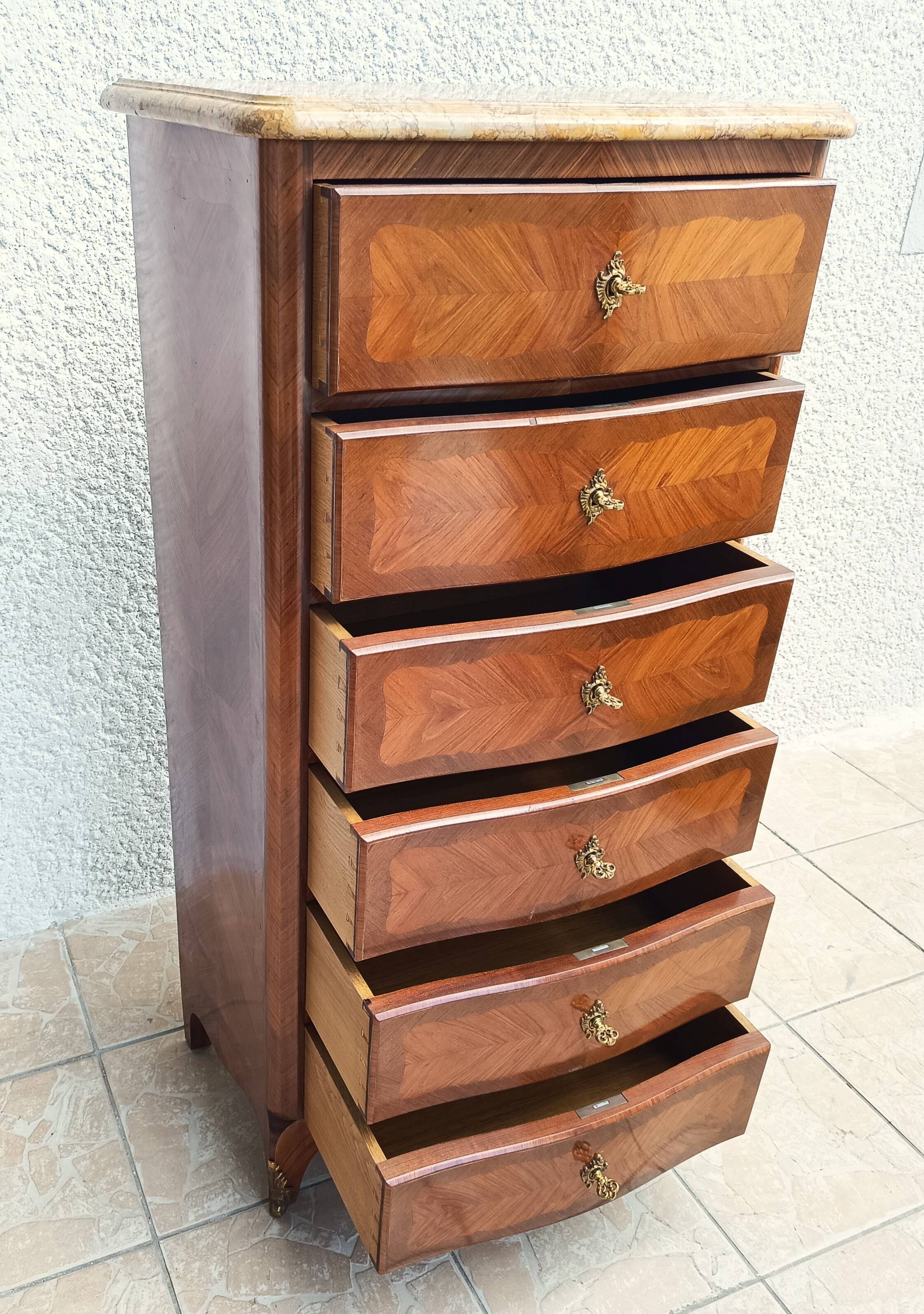 Louis XV style chest of drawers in precious wood veneer.