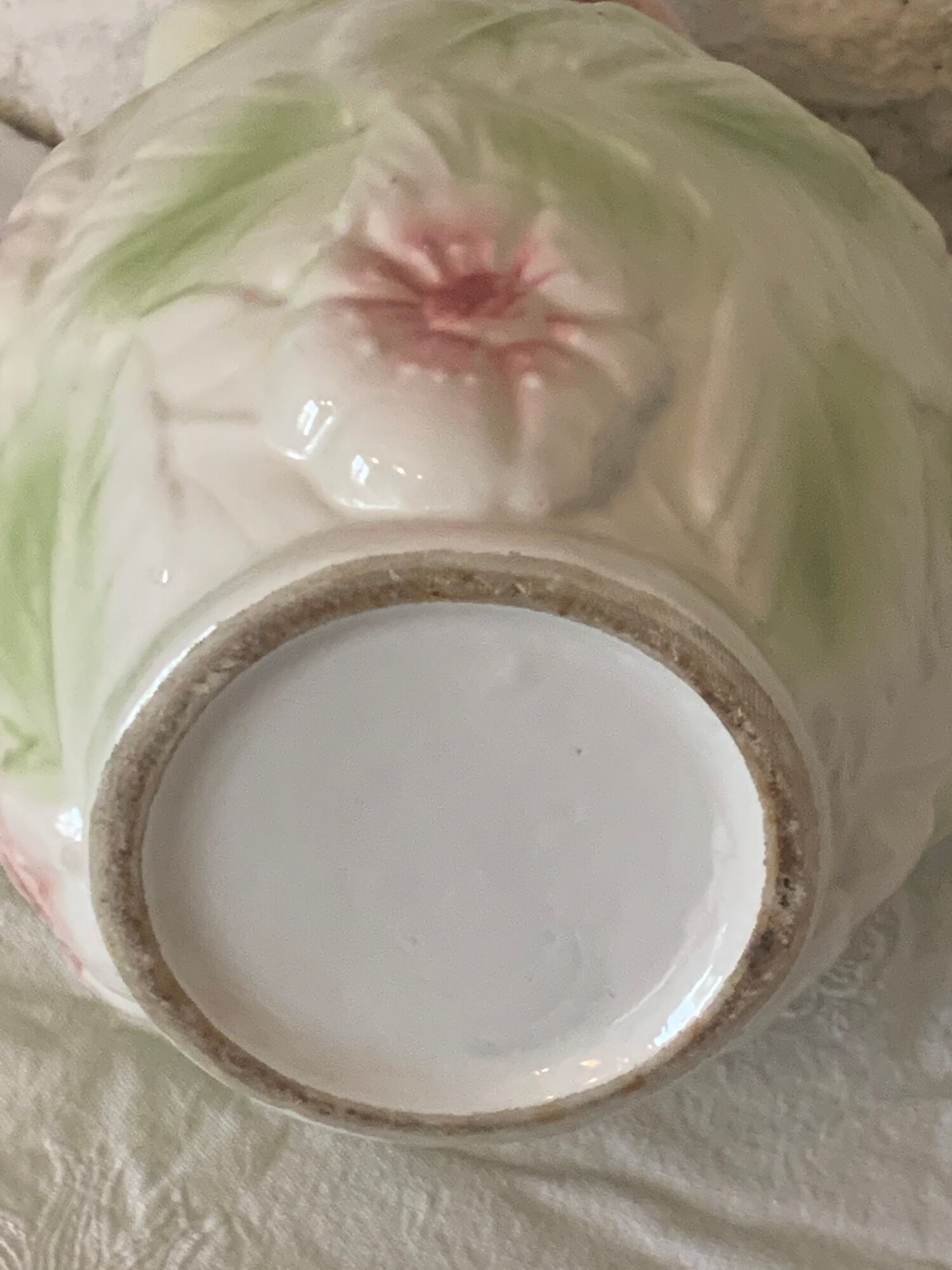 Ceramic dabbling jug enamelled floral motif
