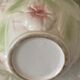 Ceramic dabbling jug enamelled floral motif