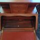 Brown mahogany secretary desk with marquetry