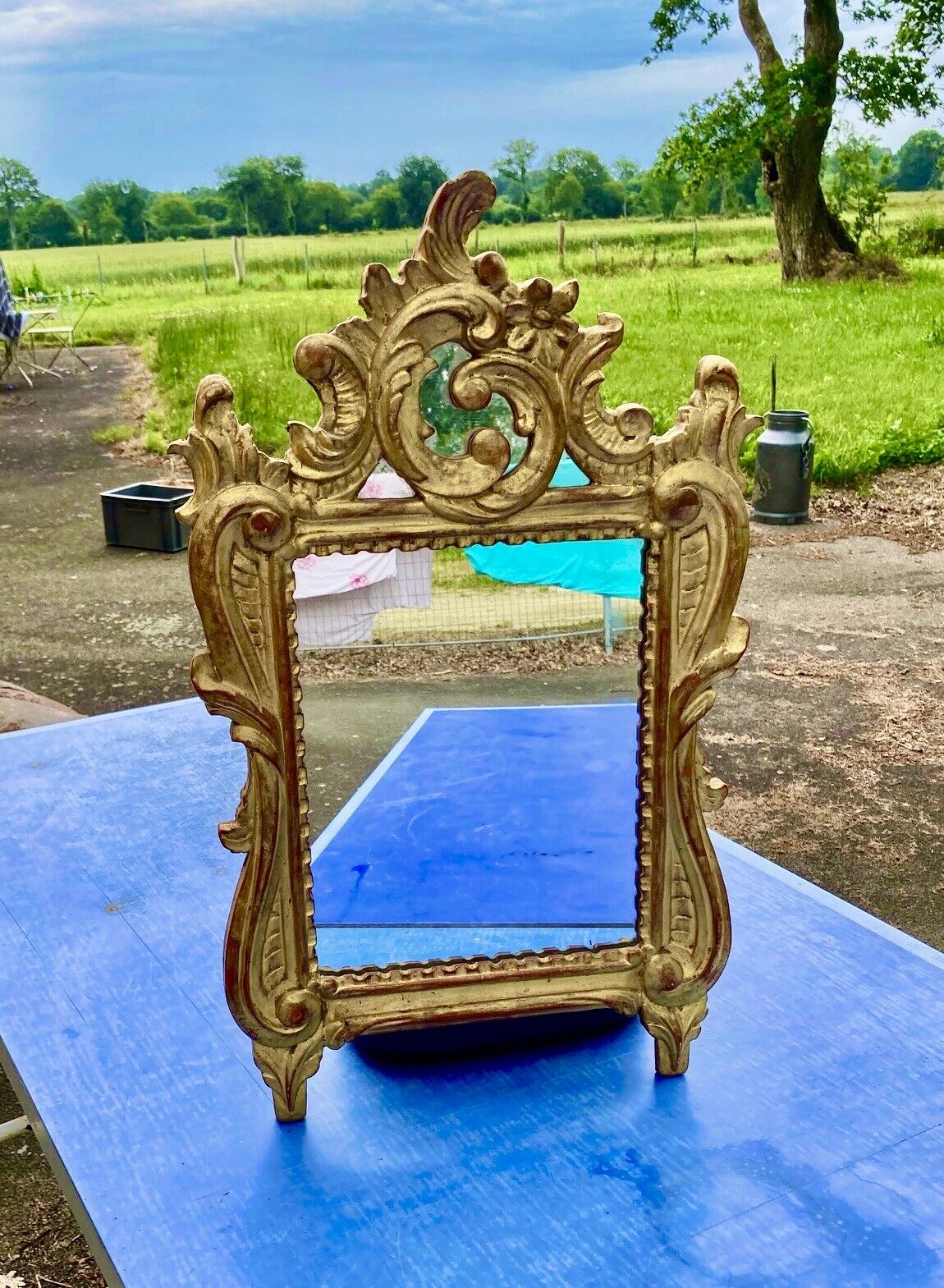 Carved and gilded wooden mirror with mercury ice sheet, Louis XV XVIIIth