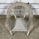 Vintage white rattan armchair