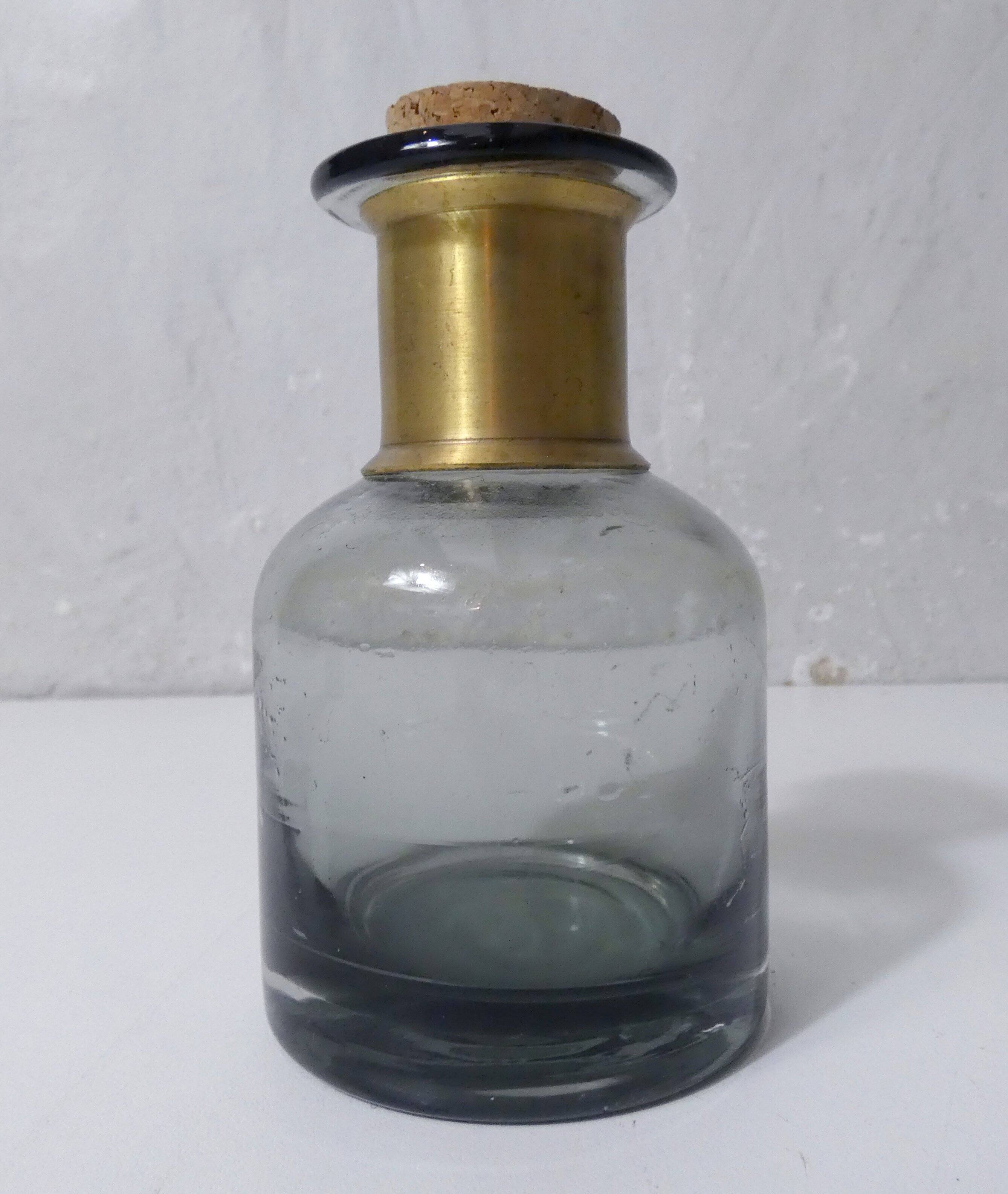 Smoked glass apothecary bottle with brass band