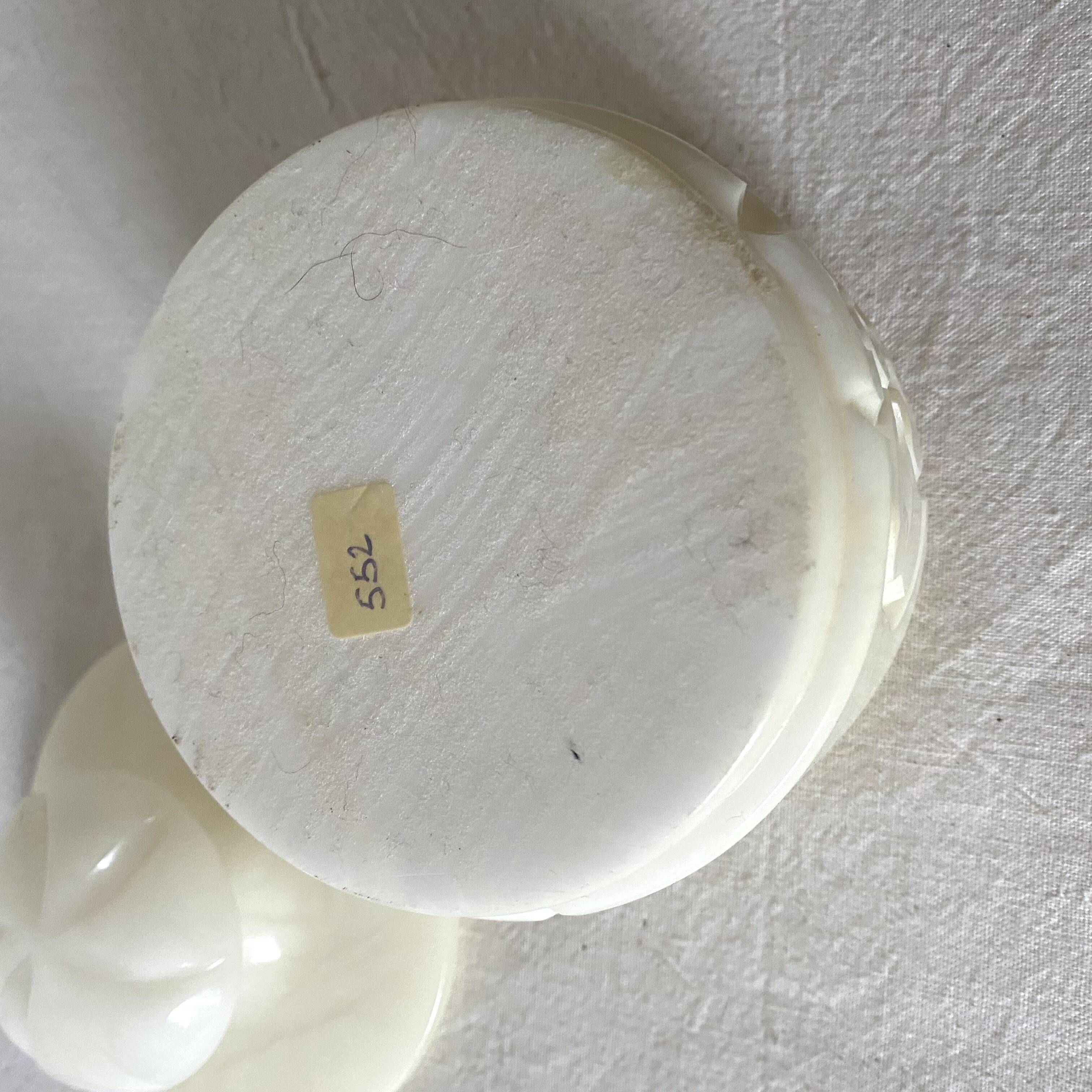 Carved alabaster pot