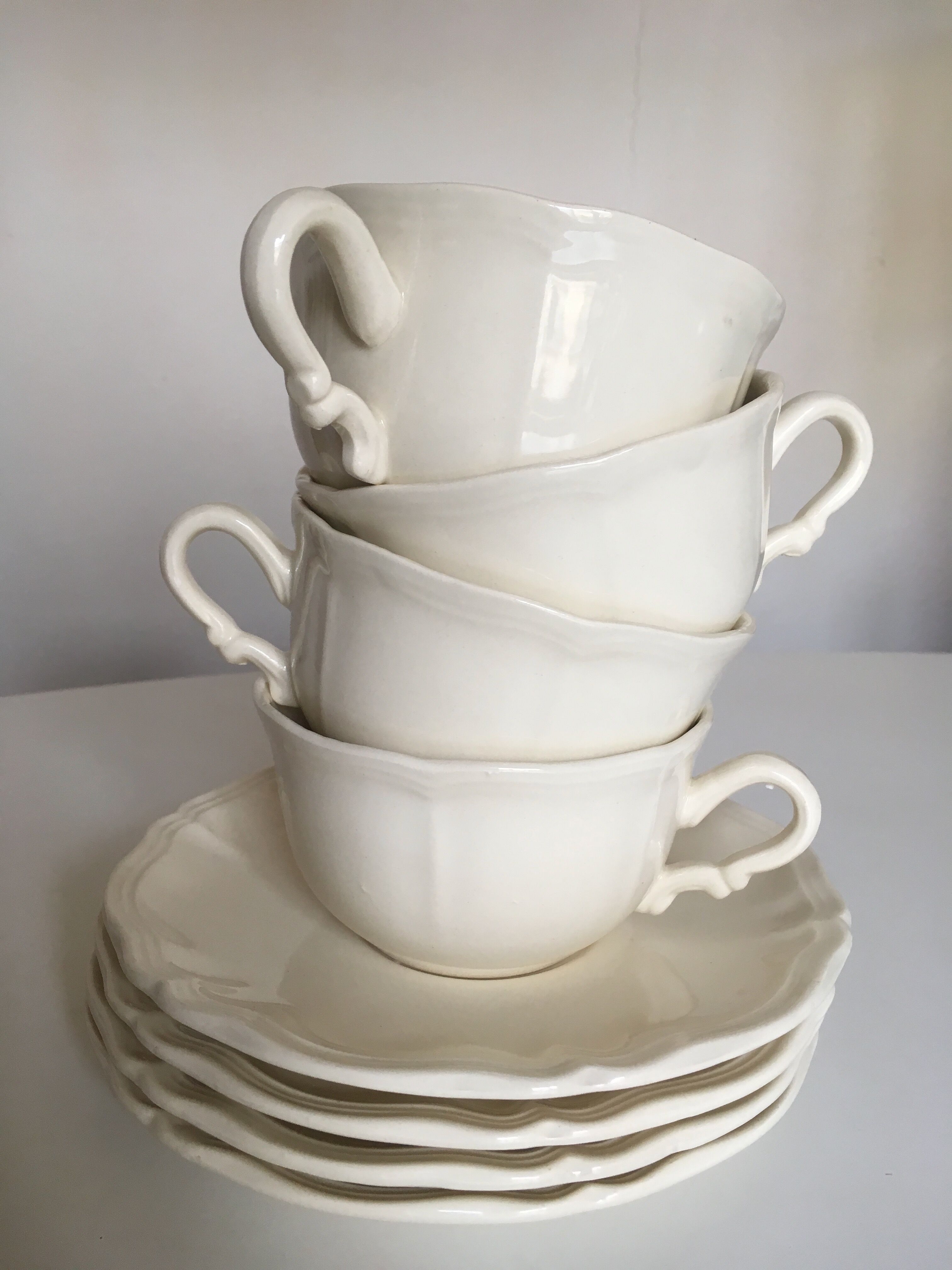 Set of 4 cups breakfasts in faience Sarreguemines ivory to godrons