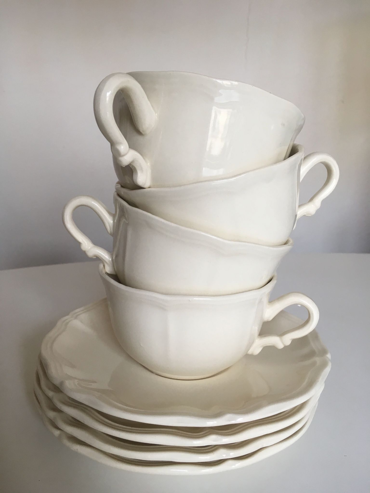Set of 4 cups breakfasts in faience Sarreguemines ivory to godrons