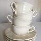 Set of 4 cups breakfasts in faience Sarreguemines ivory to godrons