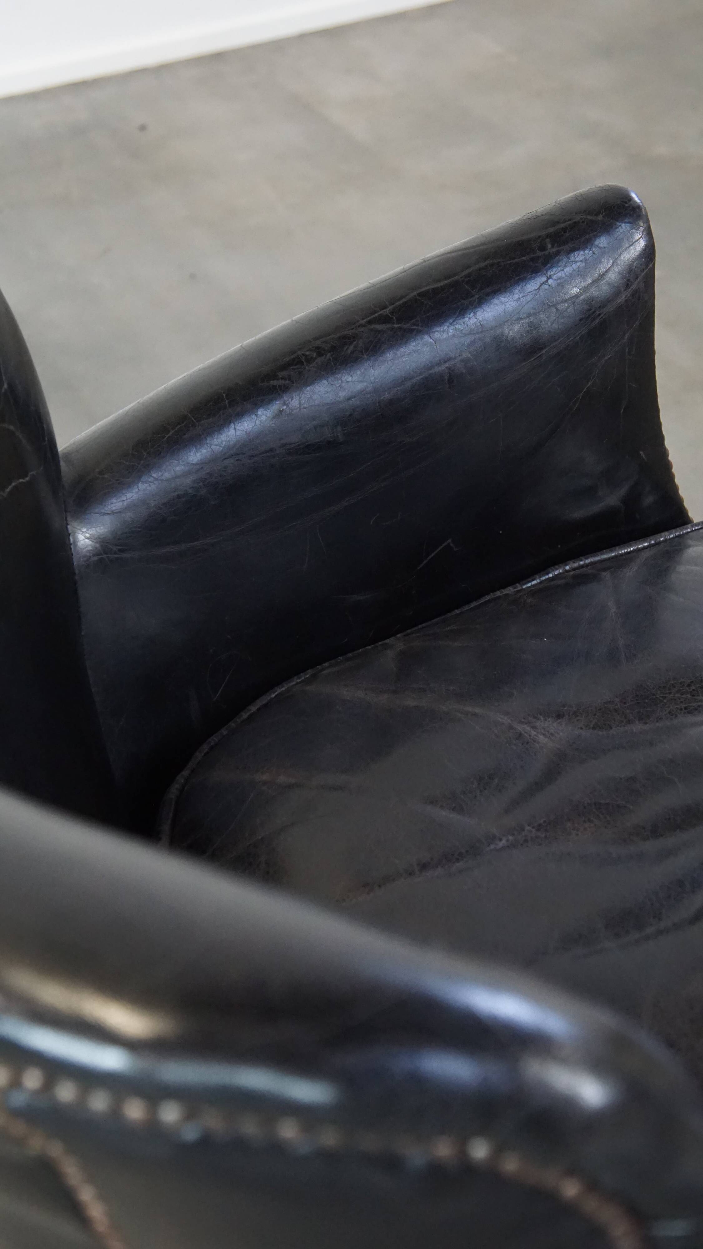 Fauteuil en cuir noir