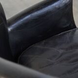Subtle black armchair with reversible Kelim seat cushion