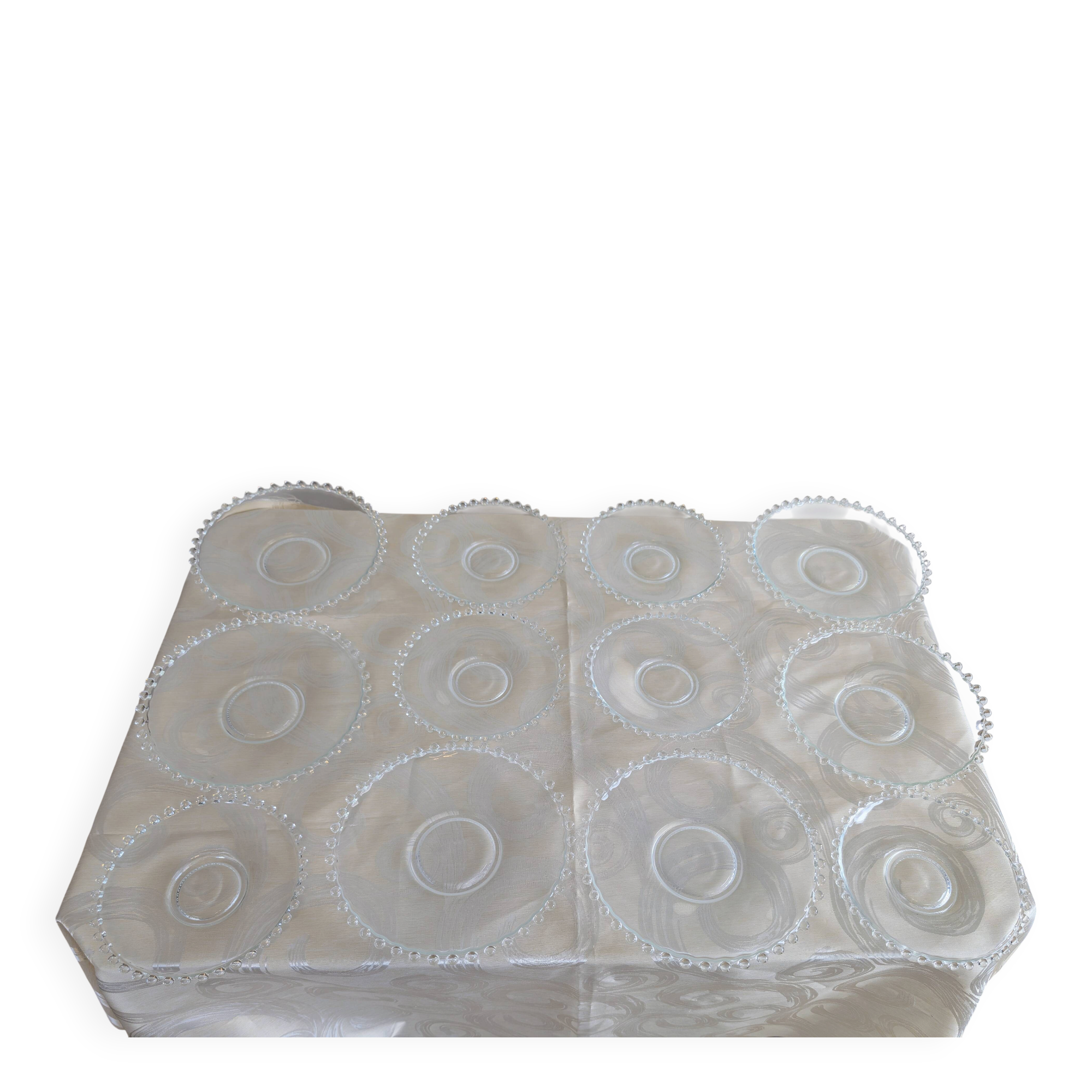 Vintage service of 12 pressed glass plates with bead decoration.