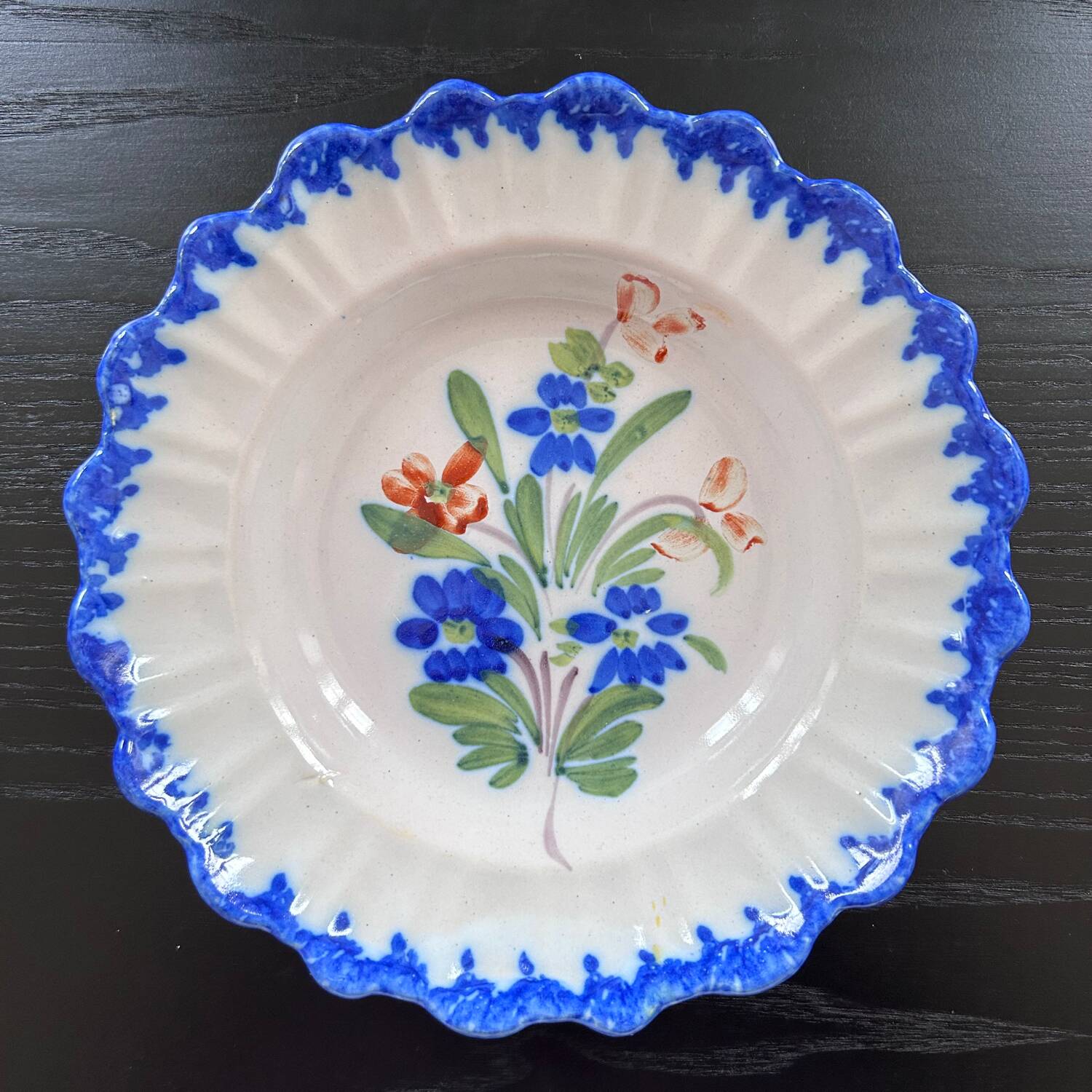Old plate with floral decoration