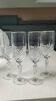 Lot of 4 large crystal flutes. Signed Arc. Height 20 cm.