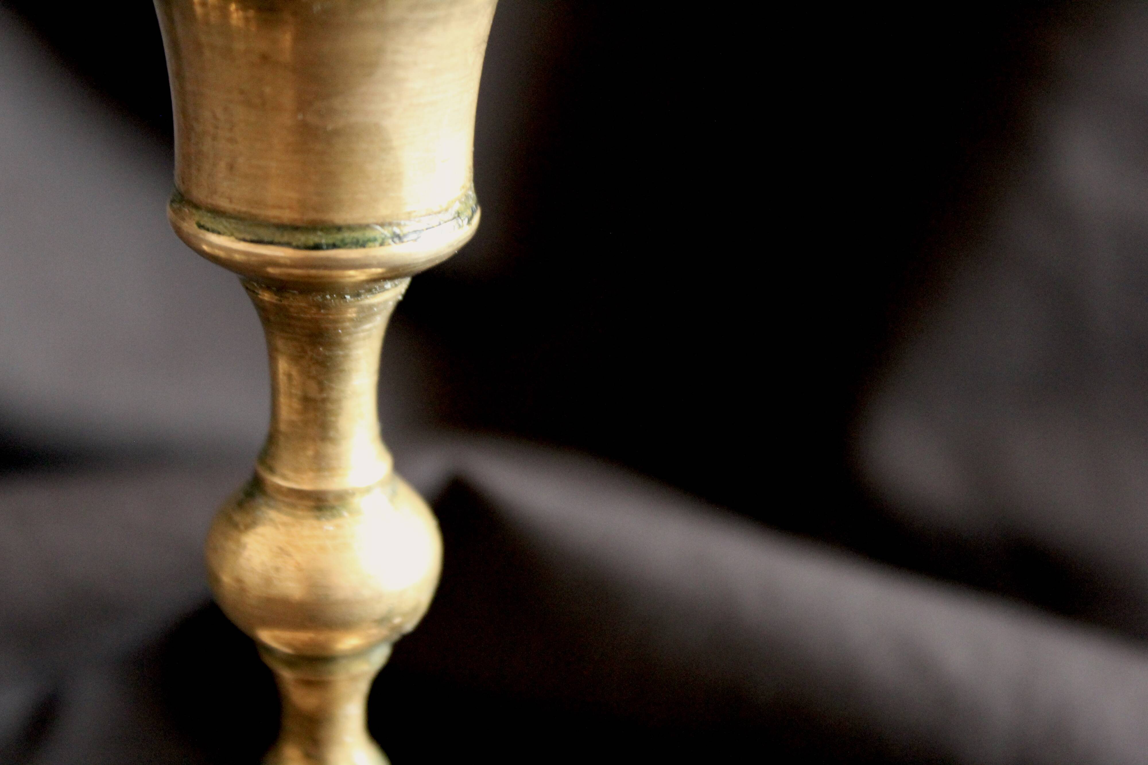 Pair of brass candle holders