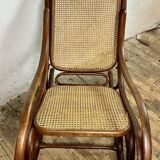 Thonet rocking chair in curved wood and cane from the 1900s