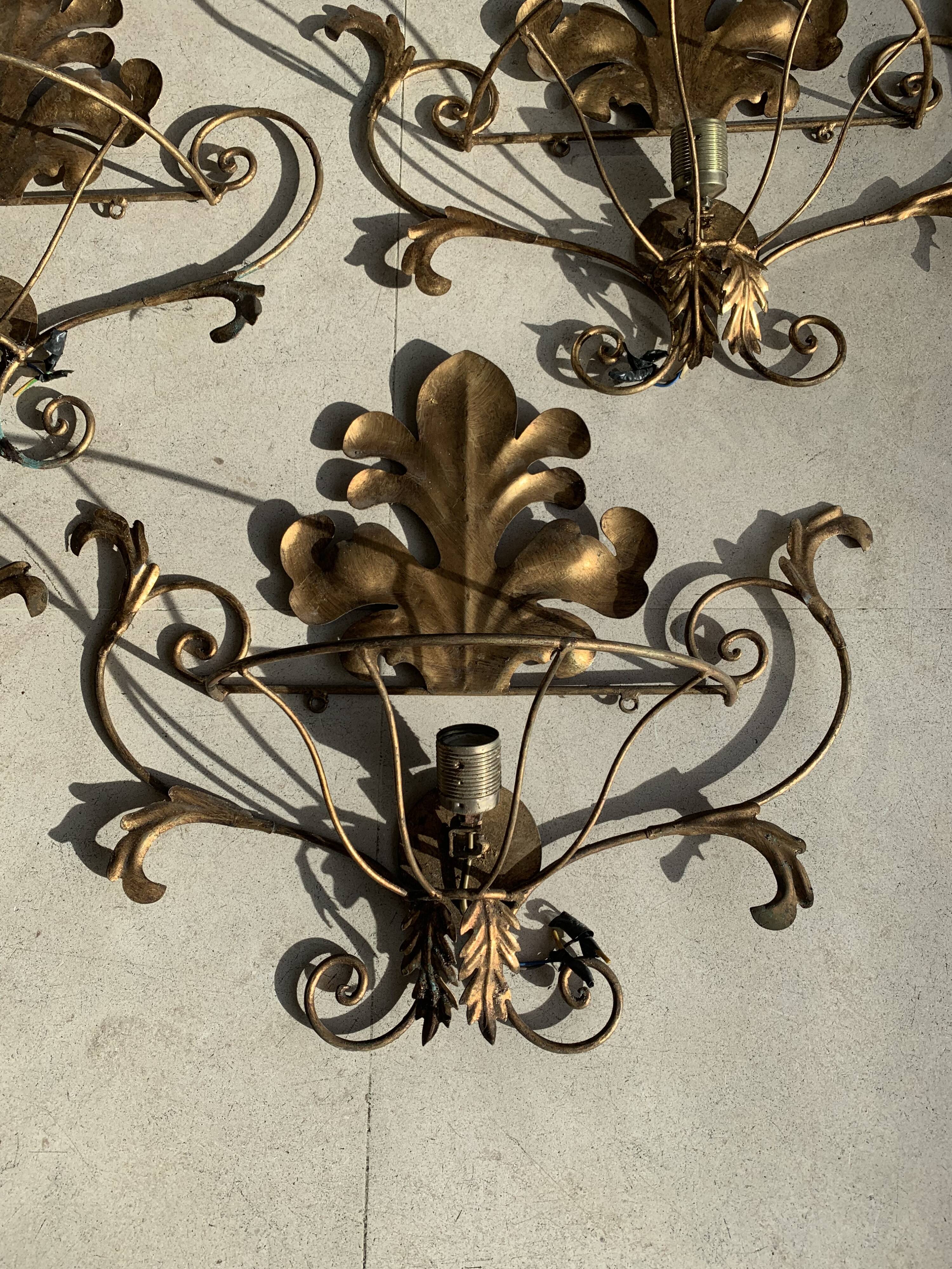 Set of gold wall lights
