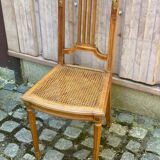 Vintage caned Louis XVI chair in solid gold wood.
