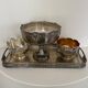 set of 3 silver metal chisel bowls with their tray