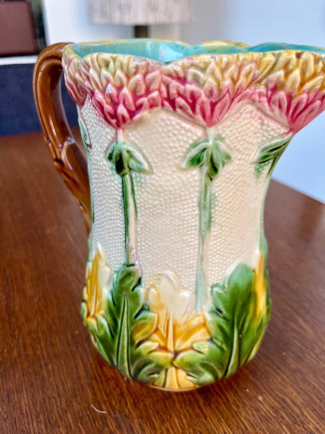 Antique floral barbotine jug – late 19th century ceramic