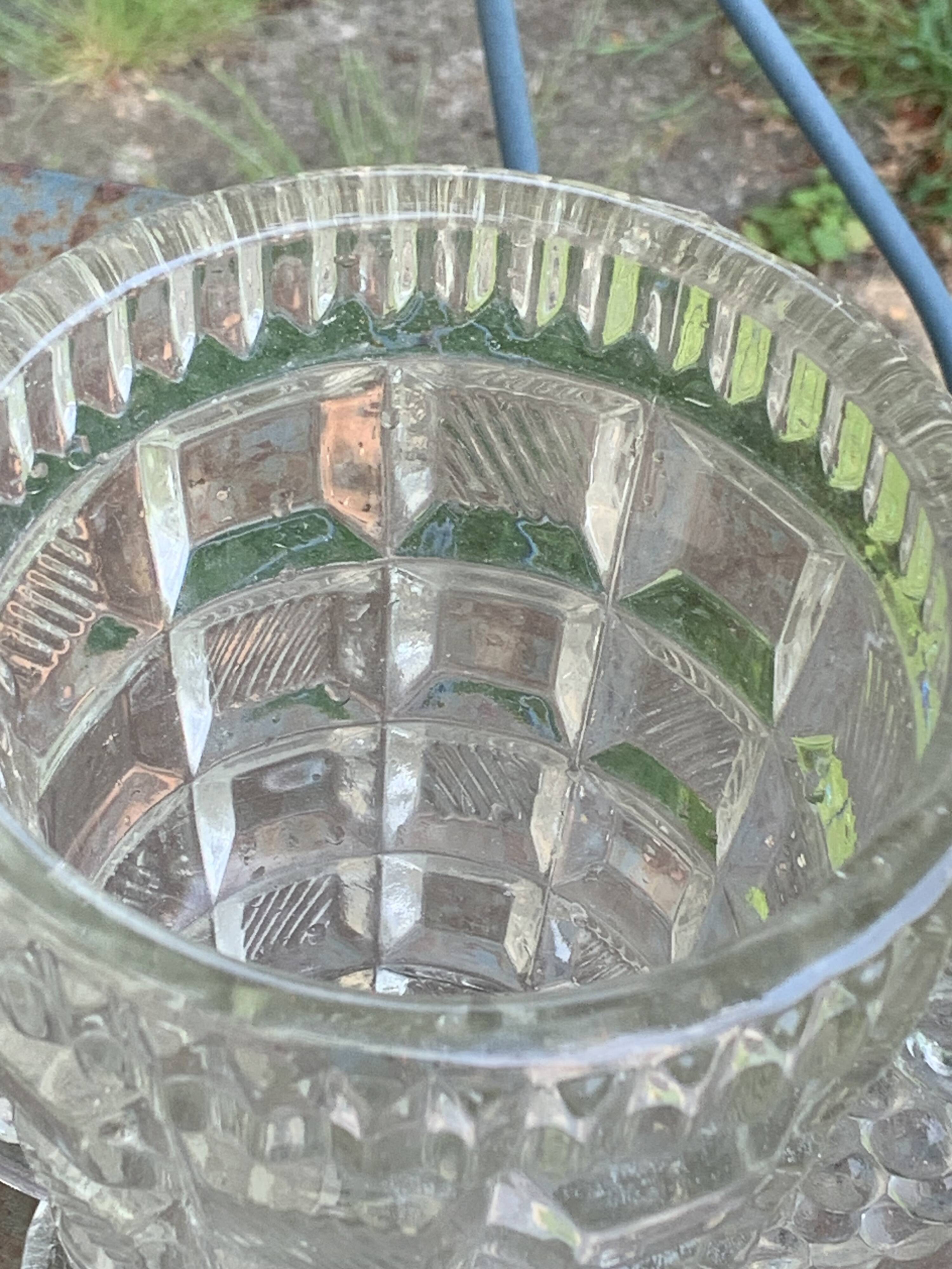 Angel wings vase, in transparent glass with art deco relief pattern