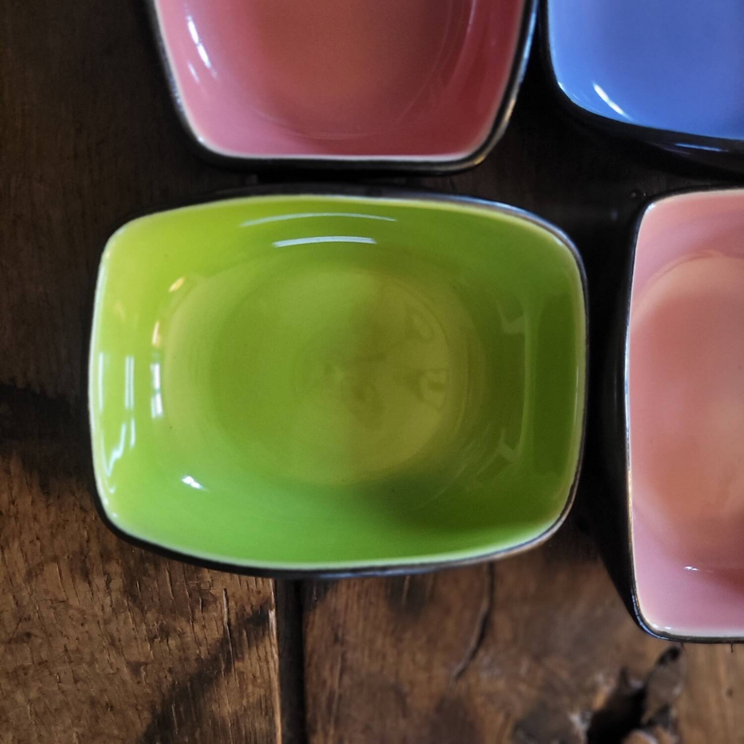 Set of 4 ceramic glazed multicoloured bowls/trinket dishes.