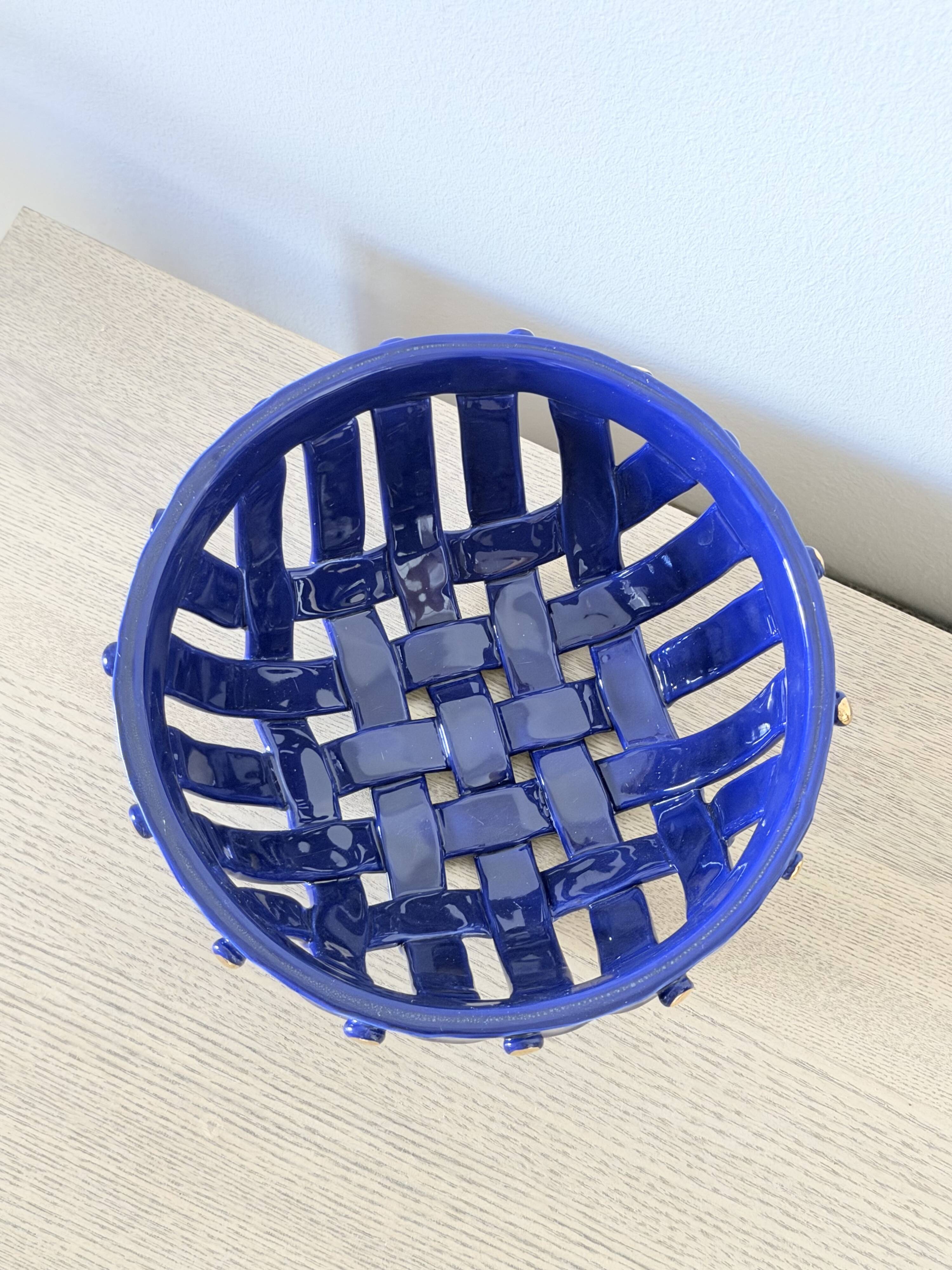 Large cobalt blue openwork bowl with golden studs