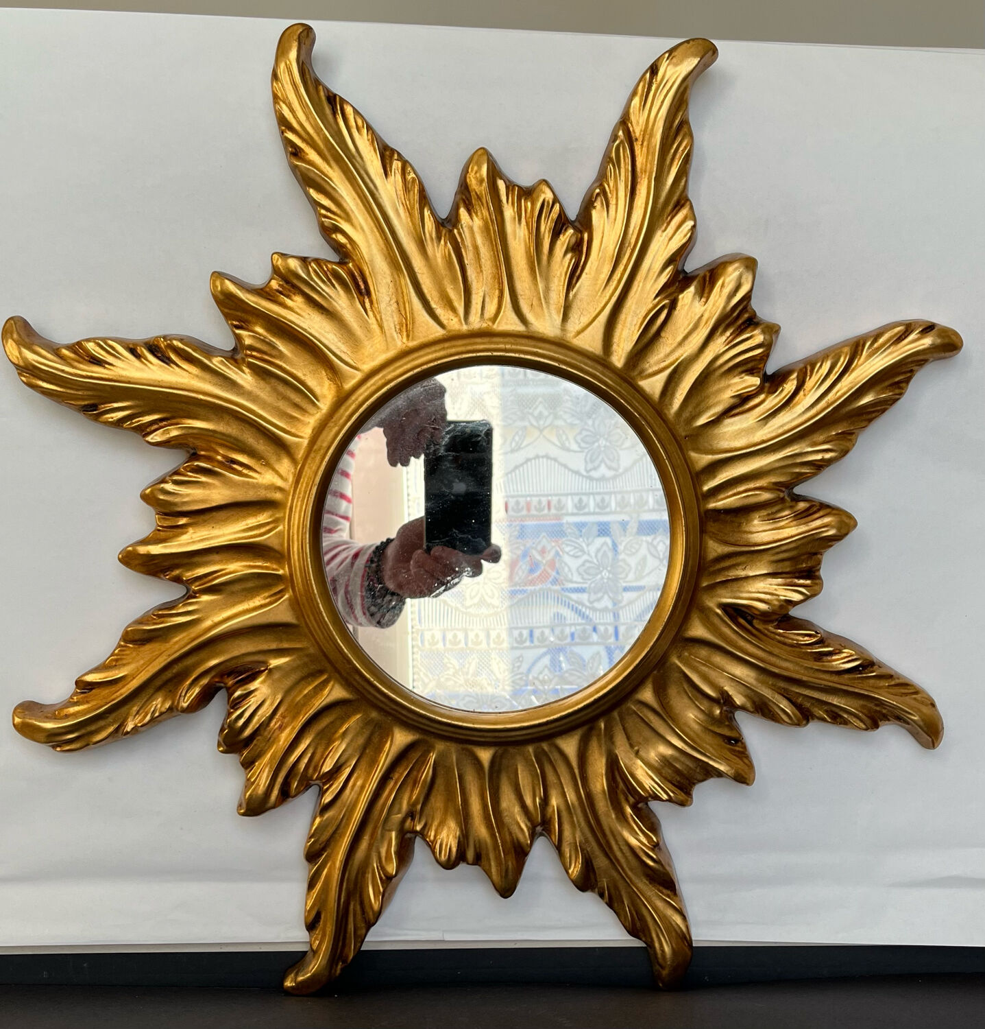 Miroir soleil en bois doré