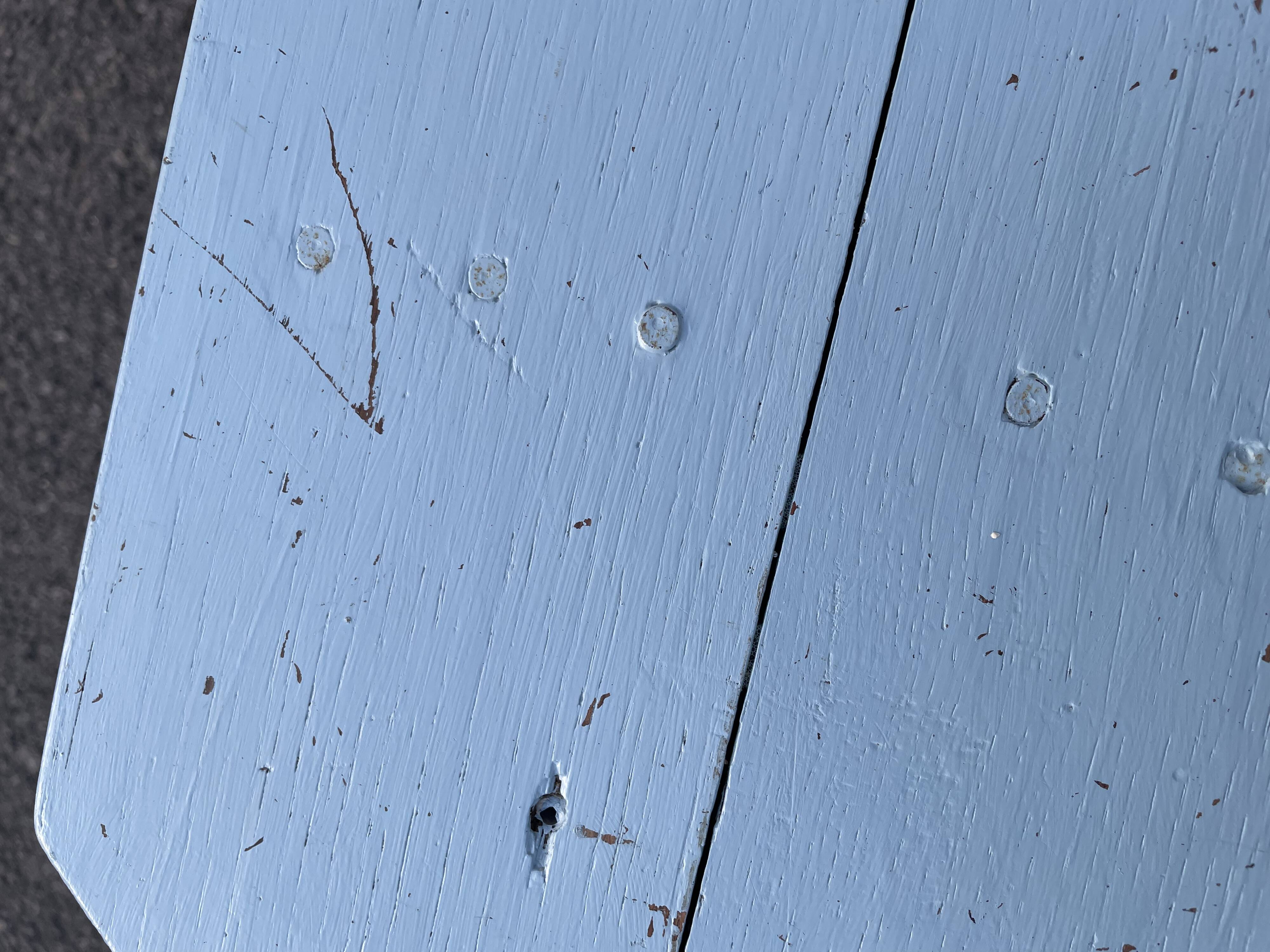 Blue painted wooden bench